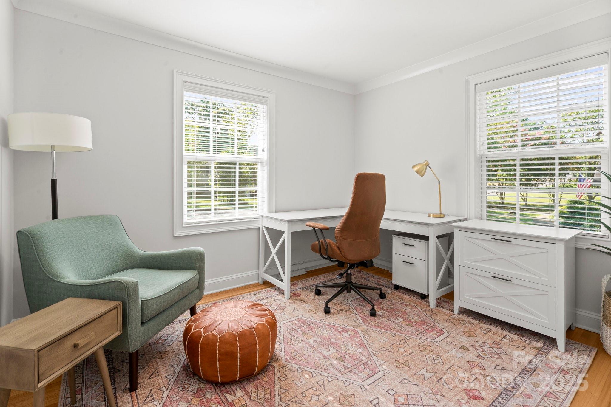 4816 Fairheath Road Charlotte, NC 28210 - Photo 17 of 35 a work room with furniture and a window
