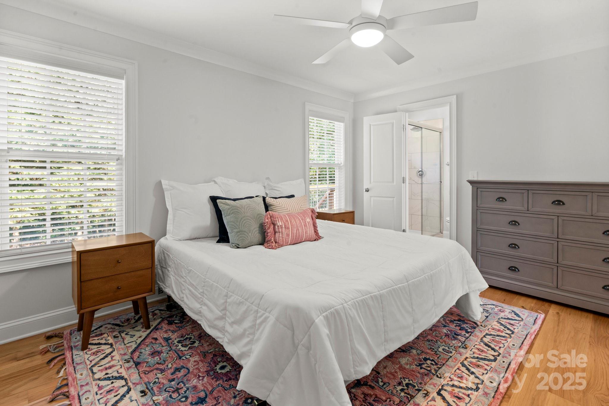 4816 Fairheath Road Charlotte, NC 28210 - Photo 18 of 35 a bedroom with a bed and window