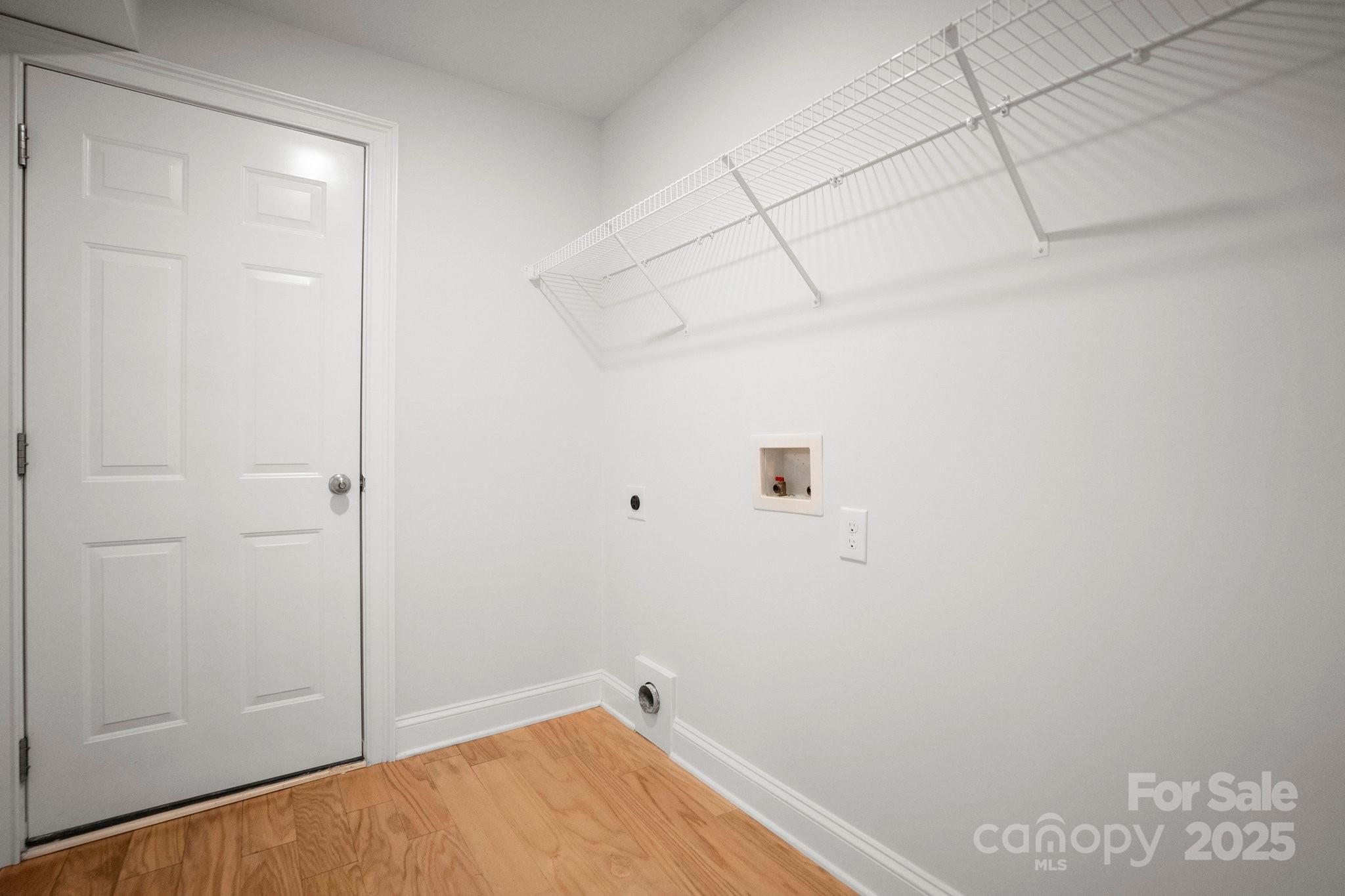 4816 Fairheath Road Charlotte, NC 28210 - Photo 24 of 35 a view of a room with racks on the wall