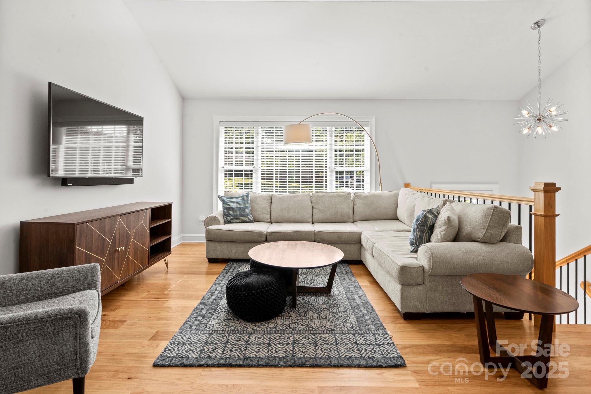 4816 Fairheath Road Charlotte, NC 28210 - Photo 3 of 35 a living room with furniture and a large window