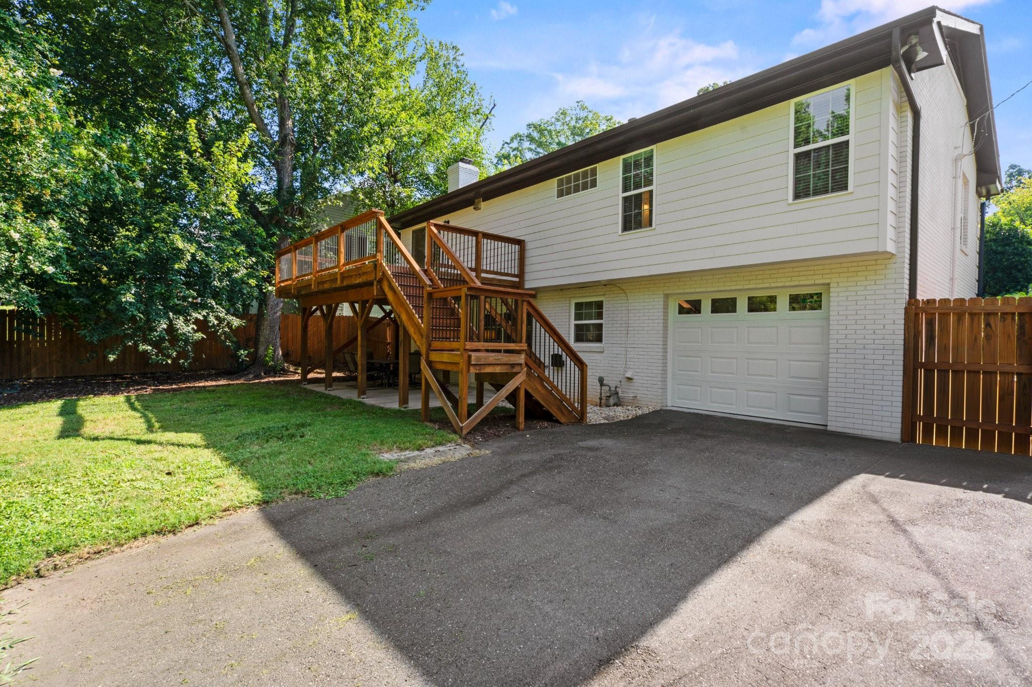 4816 Fairheath Road Charlotte, NC 28210 - Photo 33 of 35 a view of a house with a yard