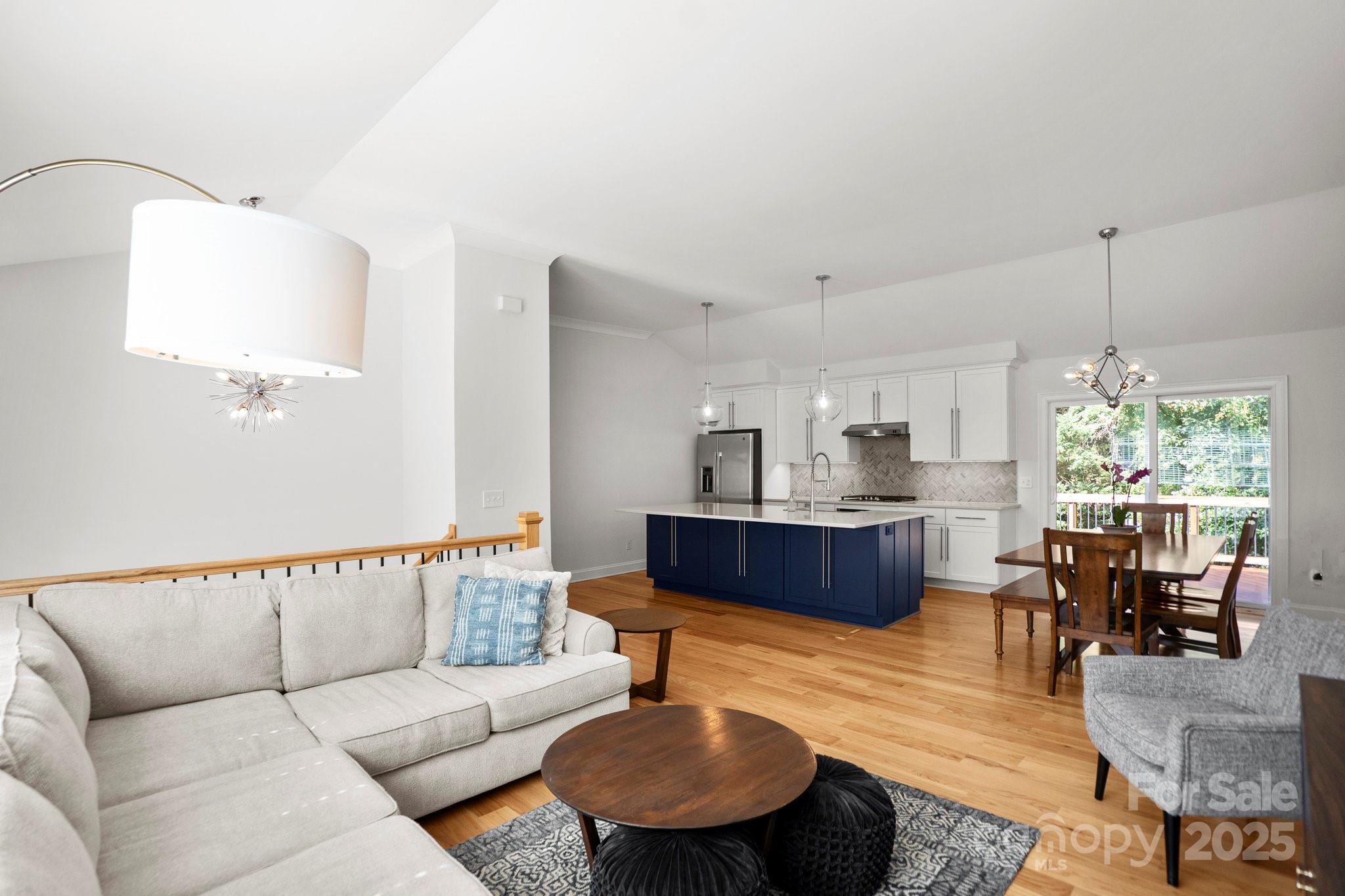 4816 Fairheath Road Charlotte, NC 28210 - Photo 4 of 35 a living room with furniture and a large window