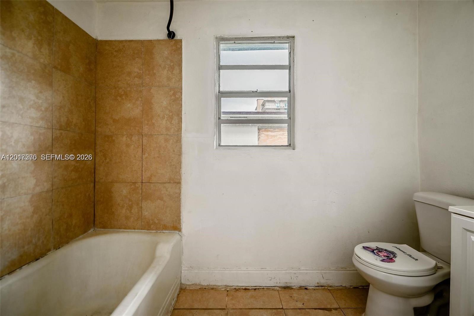 2800 Southwest 16th Terrace Miami, FL 33145 - Photo 12 of 17 a bathroom with a sink and a toilet