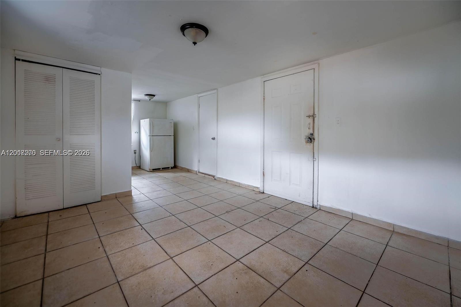 2800 Southwest 16th Terrace Miami, FL 33145 - Photo 15 of 17 a view of an empty room and window
