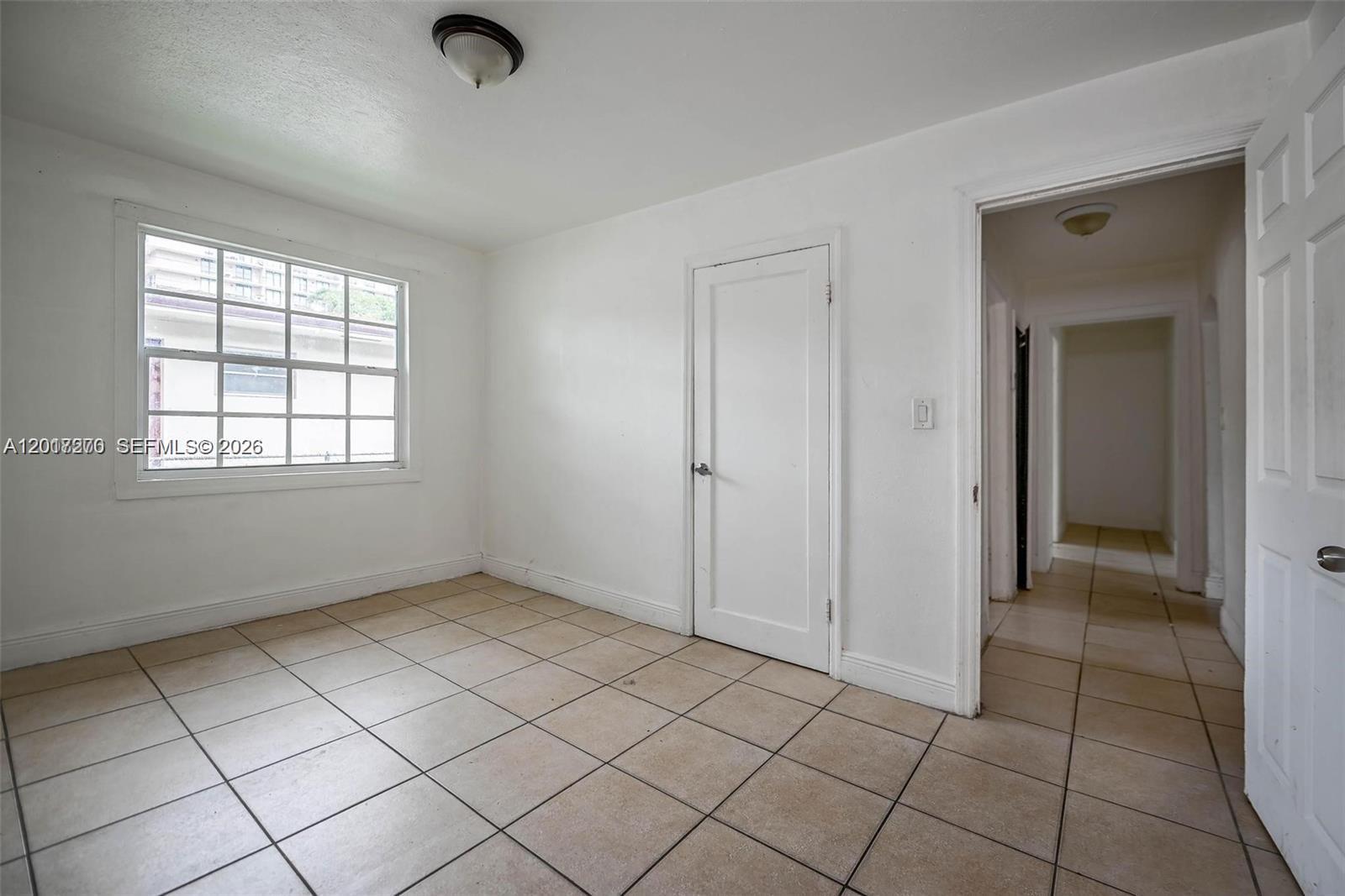 2800 Southwest 16th Terrace Miami, FL 33145 - Photo 6 of 17 an empty room with windows