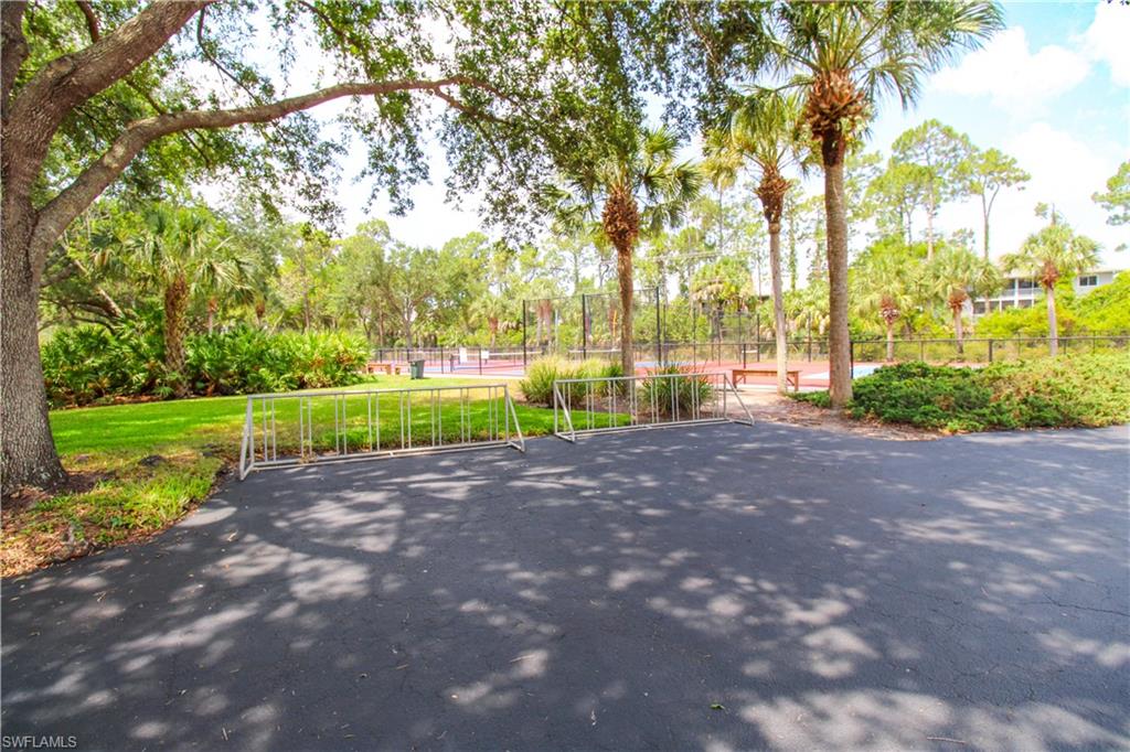 225 Robin Hood Circle, Unit 203 Naples, FL 34104 - Photo 44 of 50 View of street