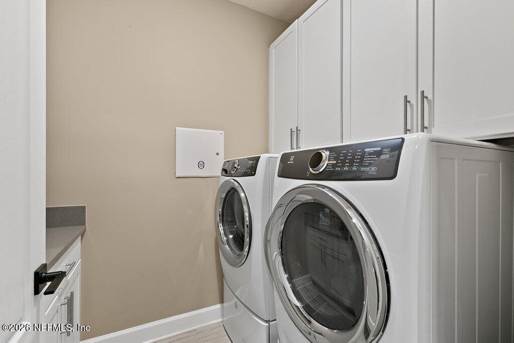 841 Ifield Road St. Augustine, FL 32095 - Photo 39 of 69 a utility room with dryer and washer