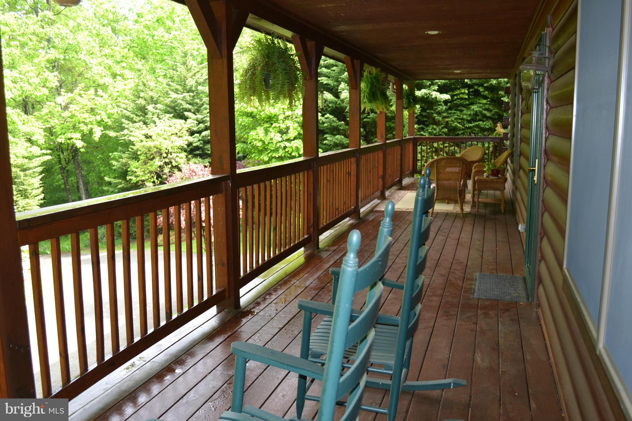 9023 Hawbottom Road Middletown, MD 21769 - Photo 4 of 27 50' long front porch overlooks nature!