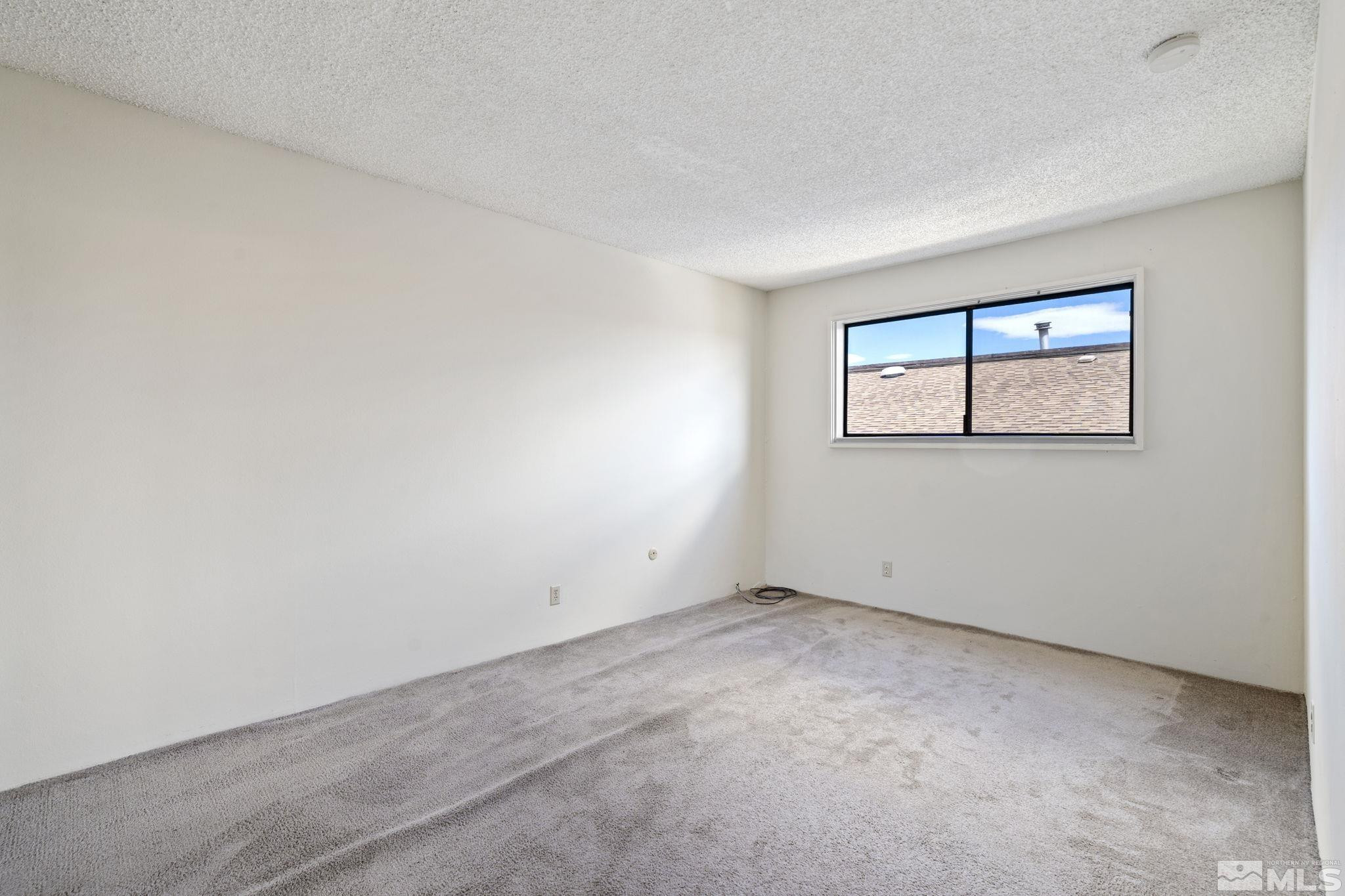 1508 Carlin Street Reno, NV 89503 - Photo 18 of 29 an empty room with windows