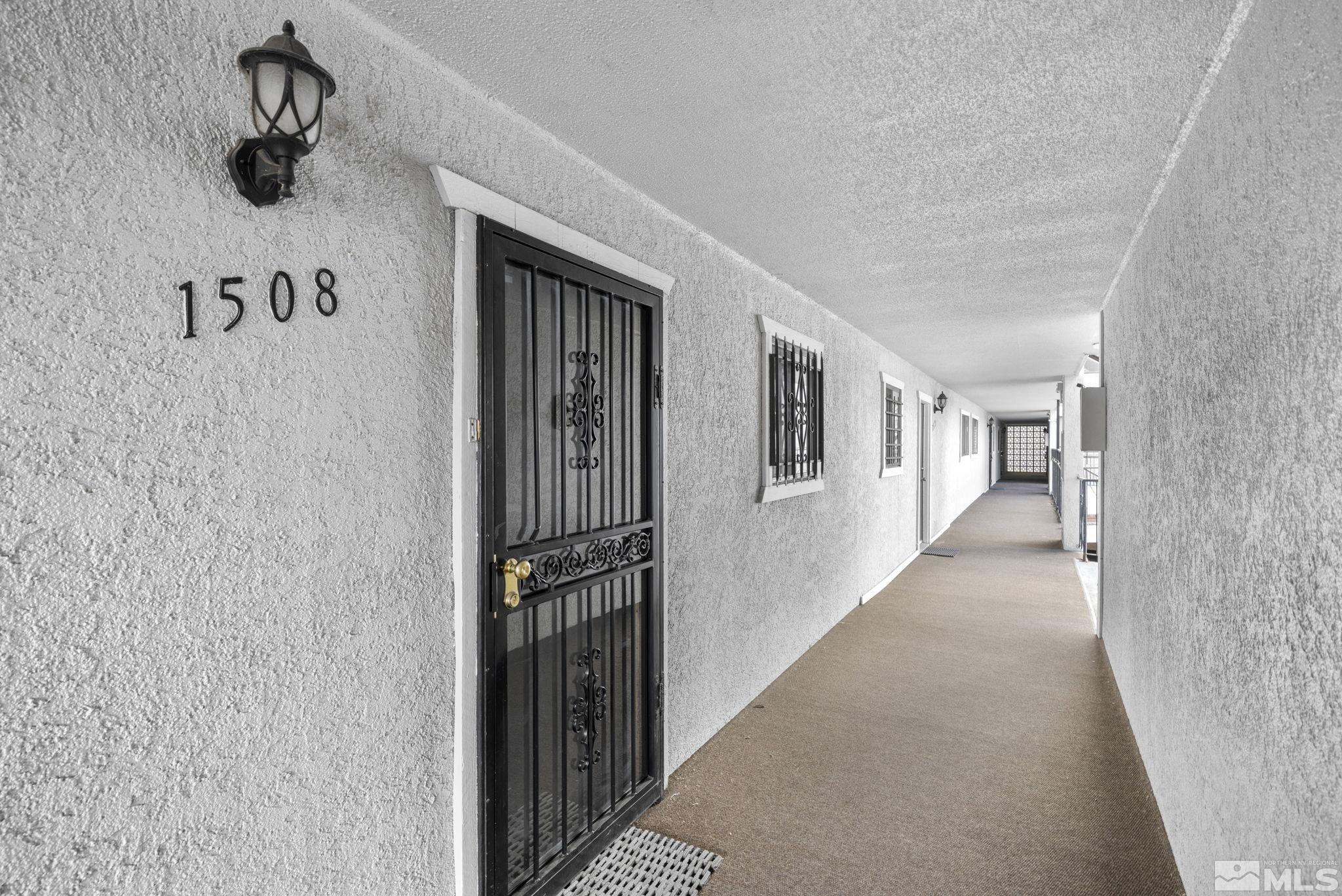 1508 Carlin Street Reno, NV 89503 - Photo 26 of 29 a view of a hallway with white walls