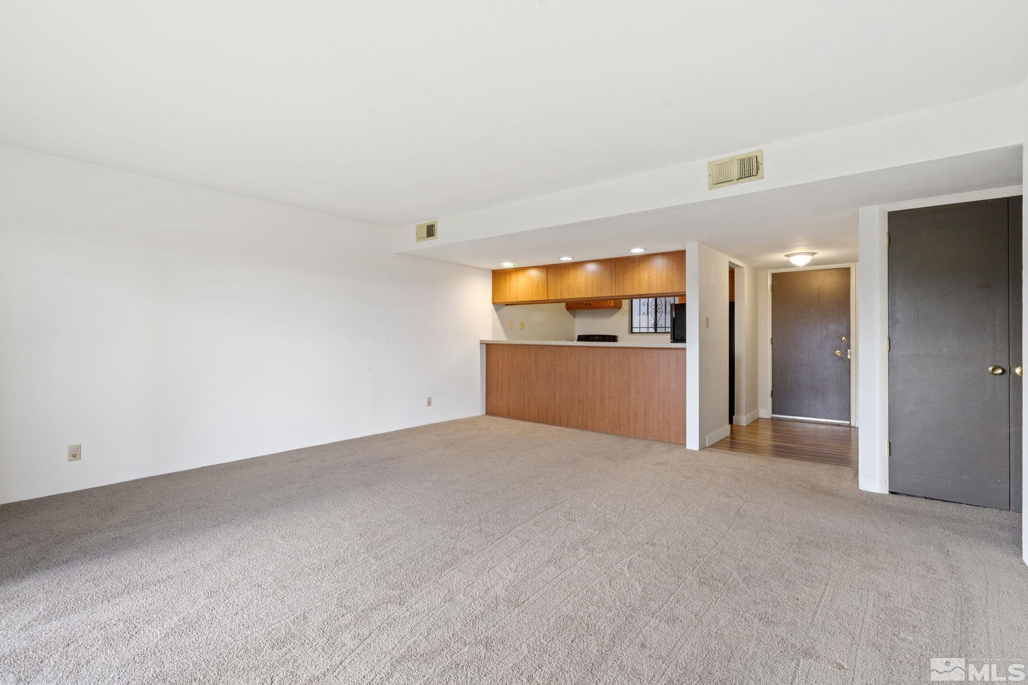 1508 Carlin Street Reno, NV 89503 - Photo 8 of 29 a view of a kitchen with a sink and a refrigerator