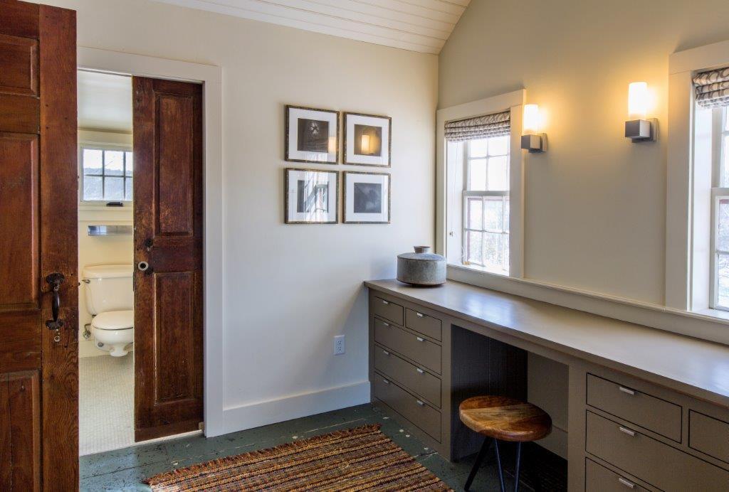 53 Depot Road Truro, MA 02666 - Photo 12 of 29 a room with mirror and window