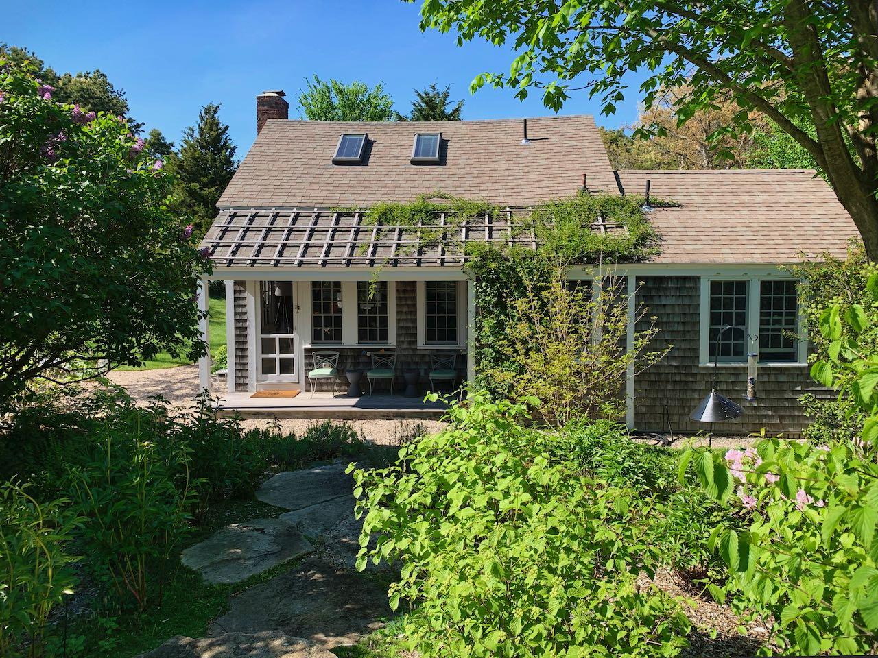 53 Depot Road Truro, MA 02666 - Photo 21 of 29 front view of a house with a yard