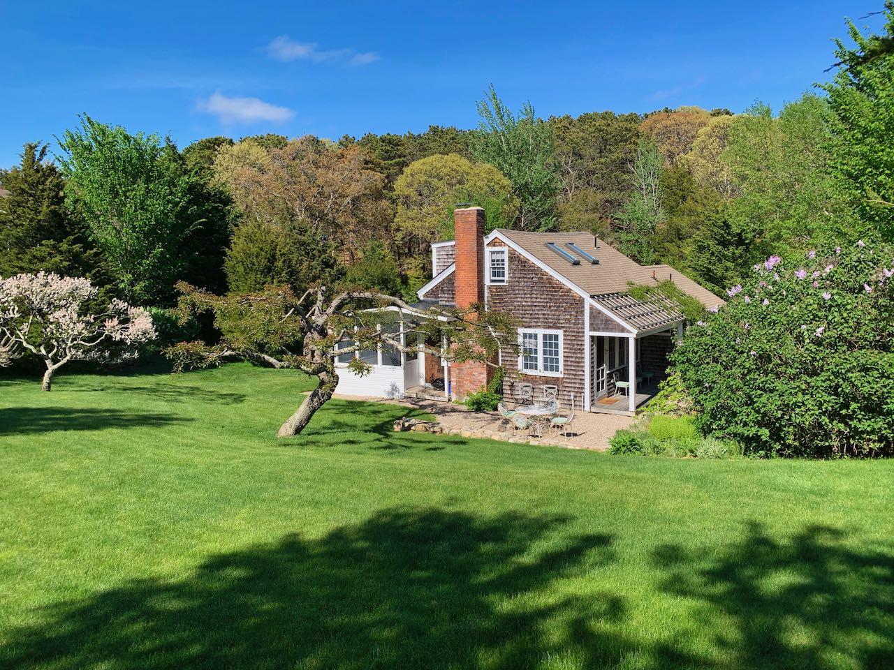 53 Depot Road Truro, MA 02666 - Photo 22 of 29 a aerial view of a house with a big yard