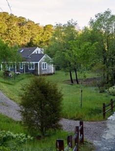 53 Depot Road Truro, MA 02666 - Photo 23 of 29 a front view of a house with a yard