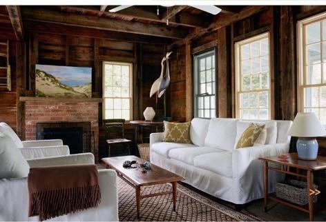 53 Depot Road Truro, MA 02666 - Photo 28 of 29 a living room with furniture a fireplace and a large window