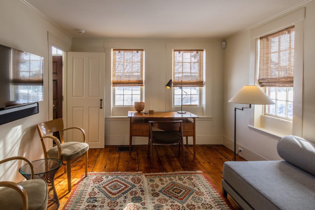 53 Depot Road Truro, MA 02666 - Photo 9 of 29 a living room with furniture and a window