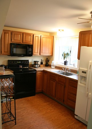 369 County Road Marion, MA 02738 - Photo 12 of 21 a kitchen with a sink a stove and microwave