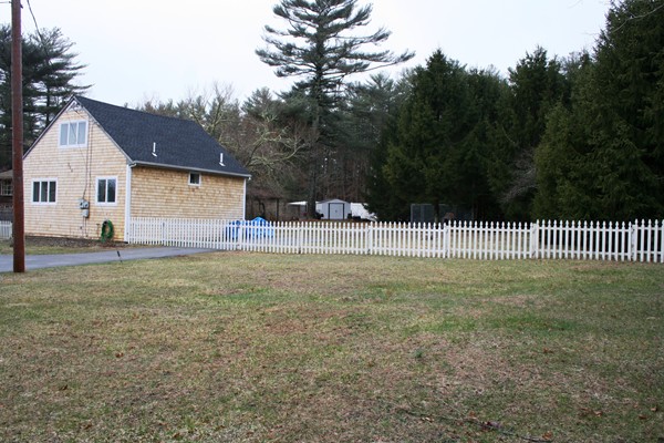 369 County Road Marion, MA 02738 - Photo 2 of 21 a view of a house with backyard and a garden