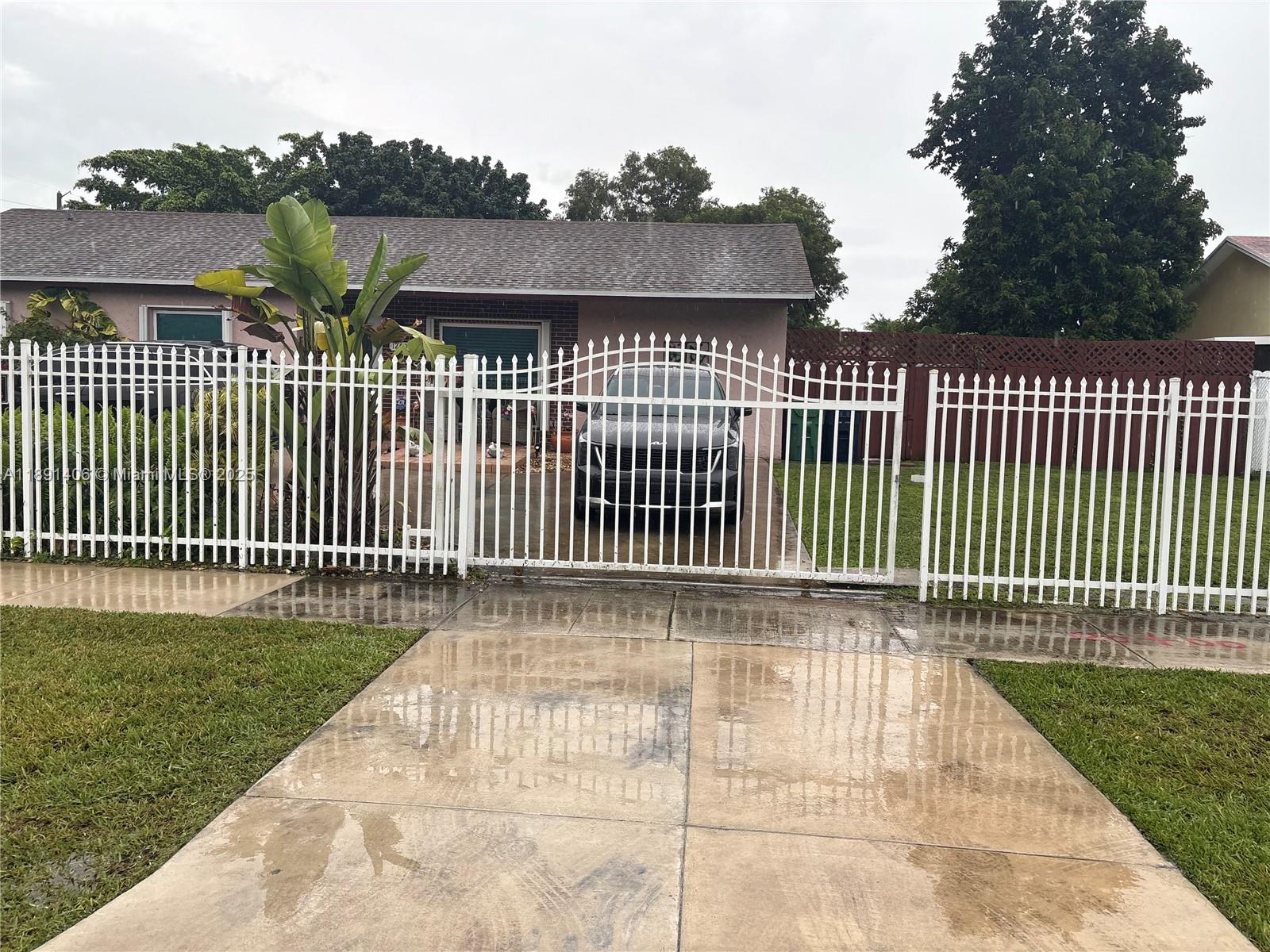 12601 Southwest 268th Street Homestead, FL 33032 - Photo 1 of 17 a view of a brick wall