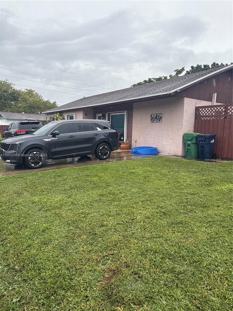 12601 Southwest 268th Street Homestead, FL 33032 - Photo 17 of 17 a view of a house with a back yard