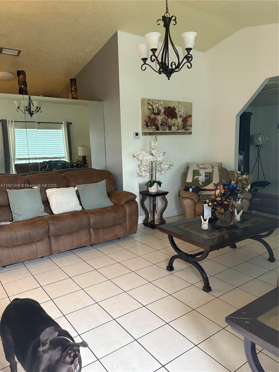 12601 Southwest 268th Street Homestead, FL 33032 - Photo 8 of 17 a living room with furniture