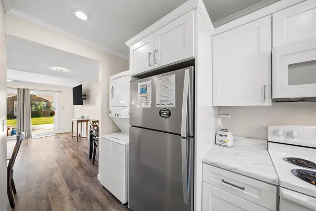 an aerial view of a city with ocean view