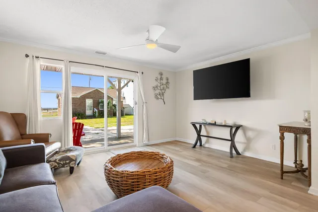 a kitchen with stainless steel appliances granite countertop a refrigerator and stove top oven