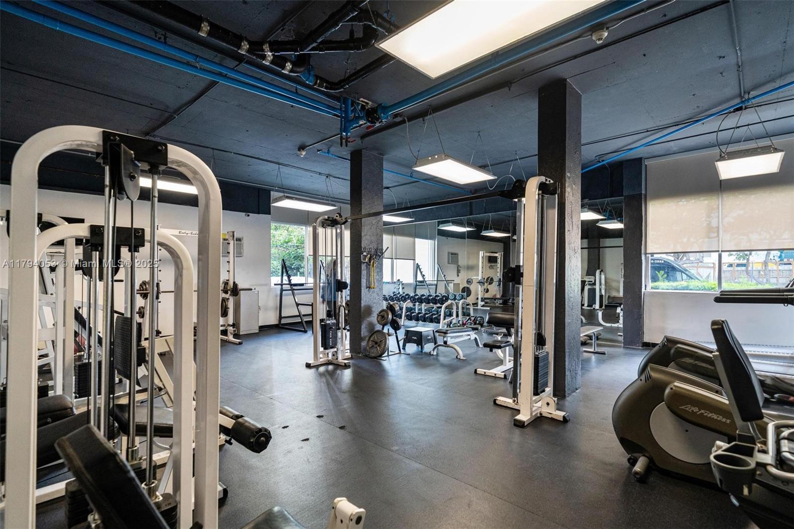 150 Southeast 25th Road, Unit 2H Miami, FL 33129 - Photo 13 of 15 a view of gym