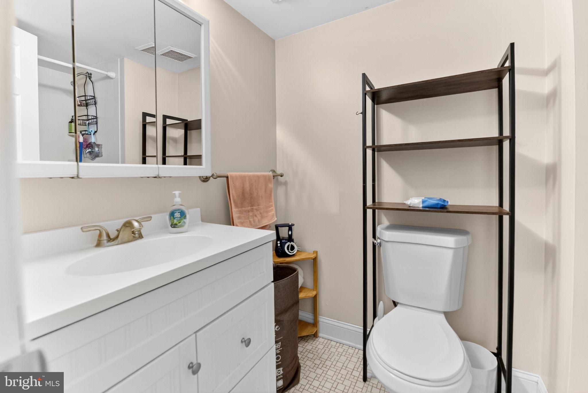 22 Meadow Lane New Hope, PA 18938 - Photo 13 of 21 a bathroom with a toilet sink vanity shower and mirror