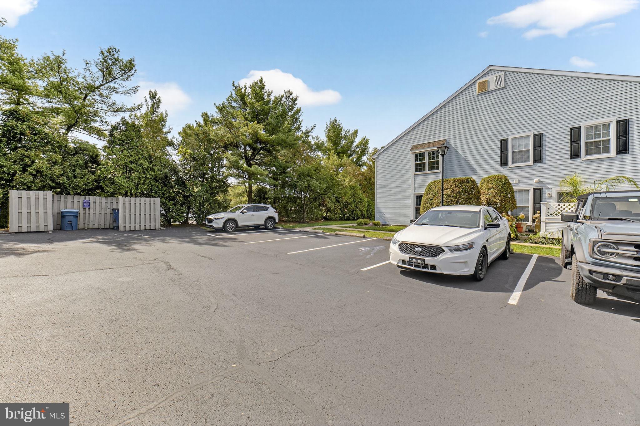 22 Meadow Lane New Hope, PA 18938 - Photo 21 of 21 a car parked in front of a white house