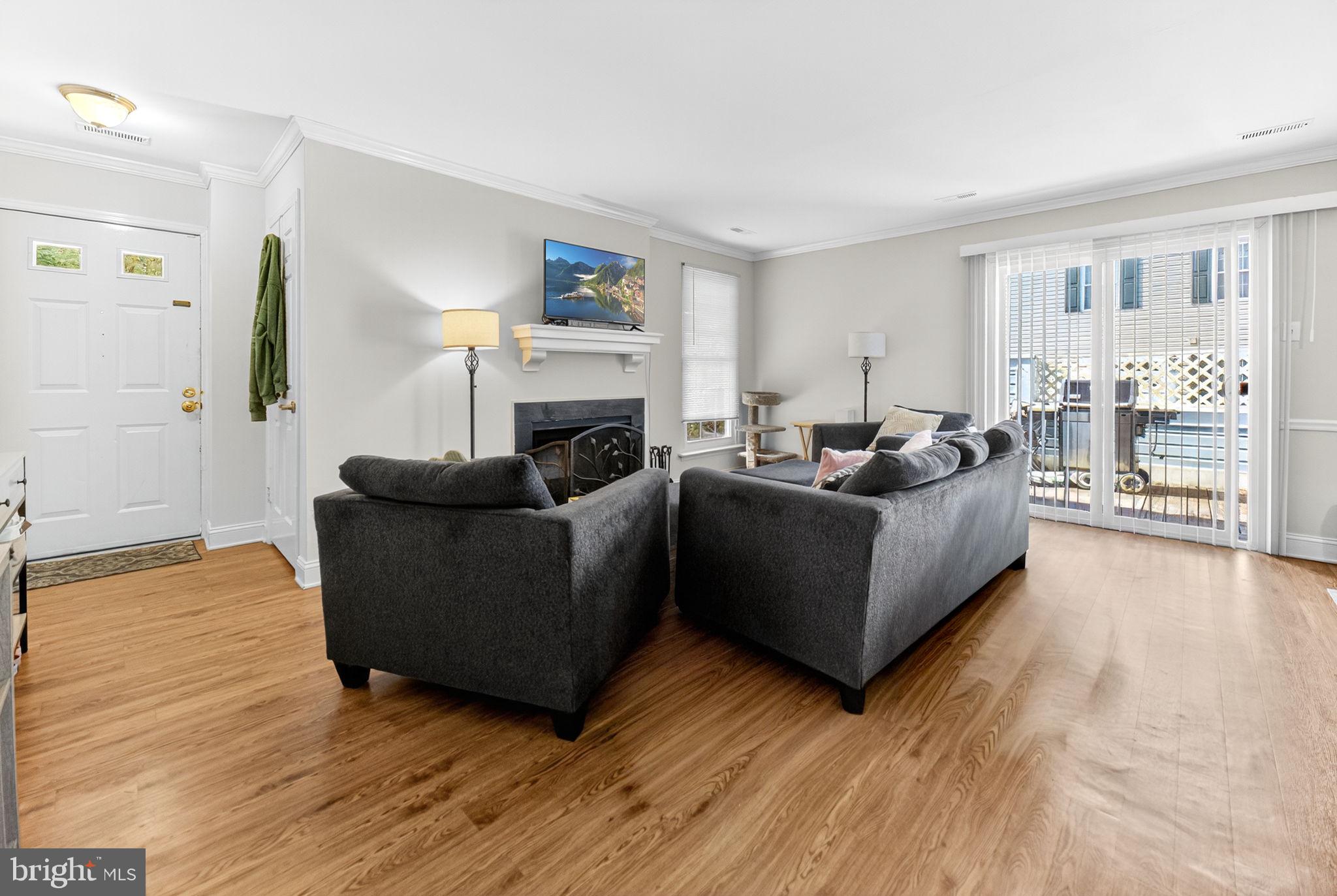 22 Meadow Lane New Hope, PA 18938 - Photo 4 of 21 a living room with furniture and a fireplace