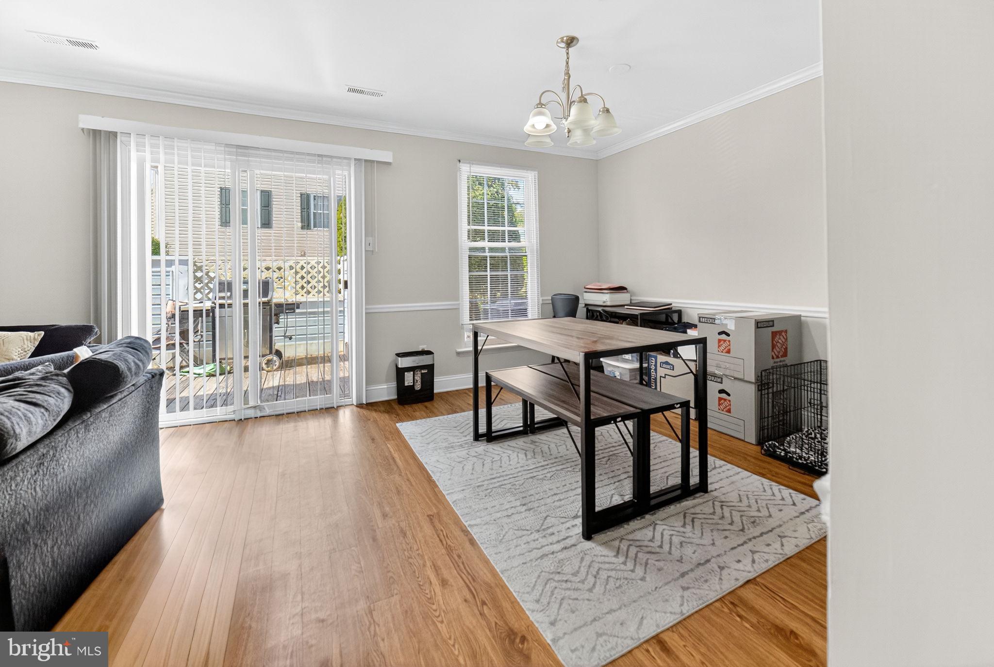 22 Meadow Lane New Hope, PA 18938 - Photo 6 of 21 a view of a livingroom with furniture and wooden floor