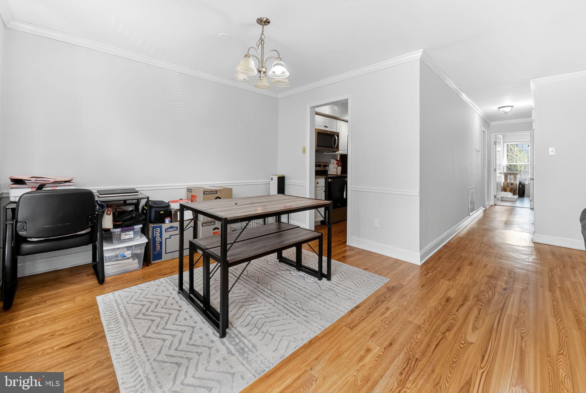 22 Meadow Lane New Hope, PA 18938 - Photo 7 of 21 a view of a livingroom with furniture and wooden floor