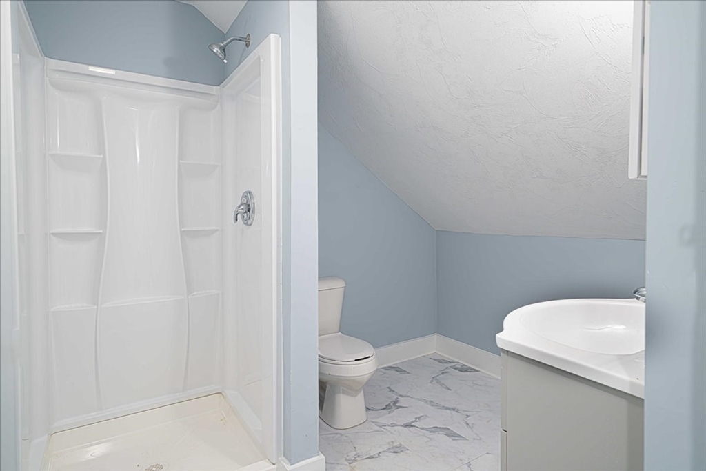 42 Silver Hill Road Milford, MA 01757 - Photo 25 of 30 a bathroom with a toilet and a shower