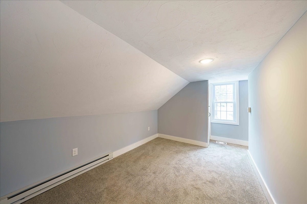 42 Silver Hill Road Milford, MA 01757 - Photo 26 of 30 an empty room with a empty space and windows