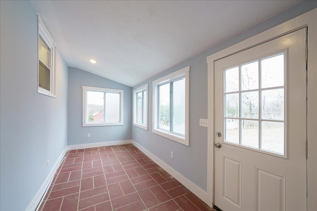 42 Silver Hill Road Milford, MA 01757 - Photo 7 of 30 a view of an empty room with a window