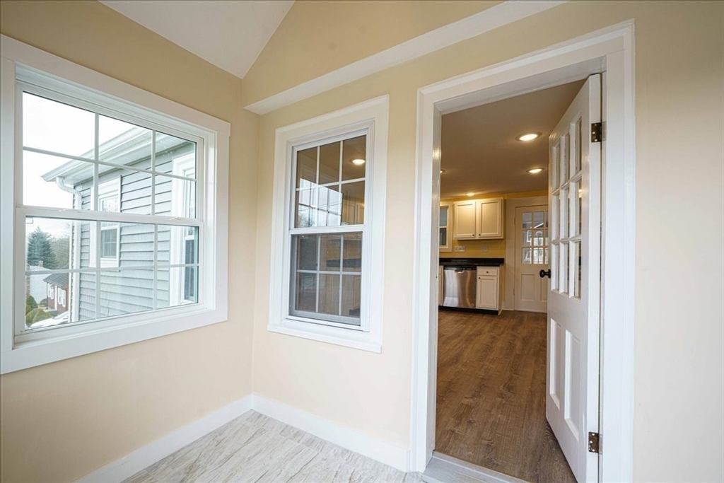 42 Silver Hill Road Milford, MA 01757 - Photo 8 of 30 an empty room with wooden floor and windows