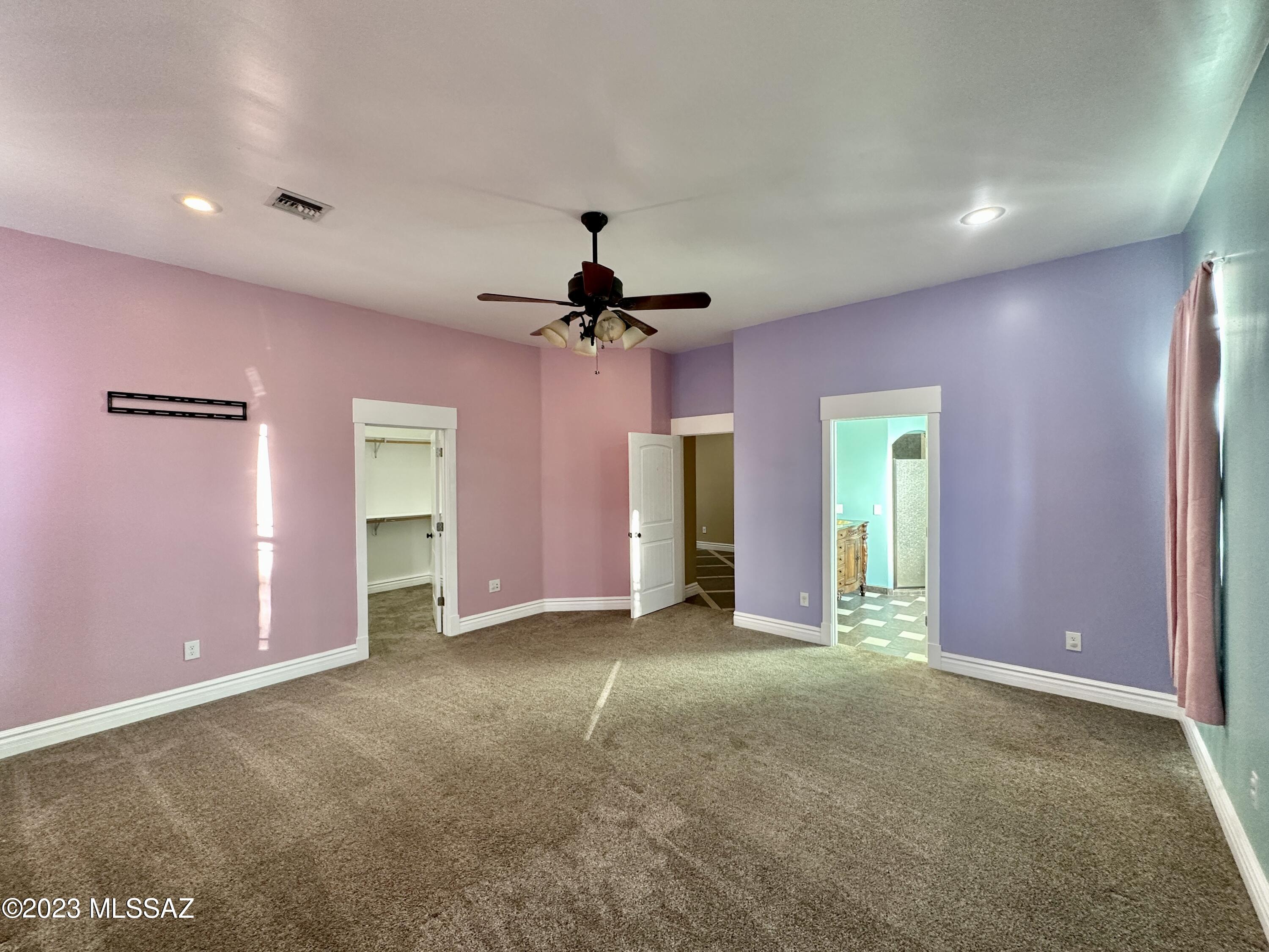 508 Eagle Meadow Loop Thatcher, AZ 85552 - Photo 12 of 32 a view of empty room with a ceiling fan