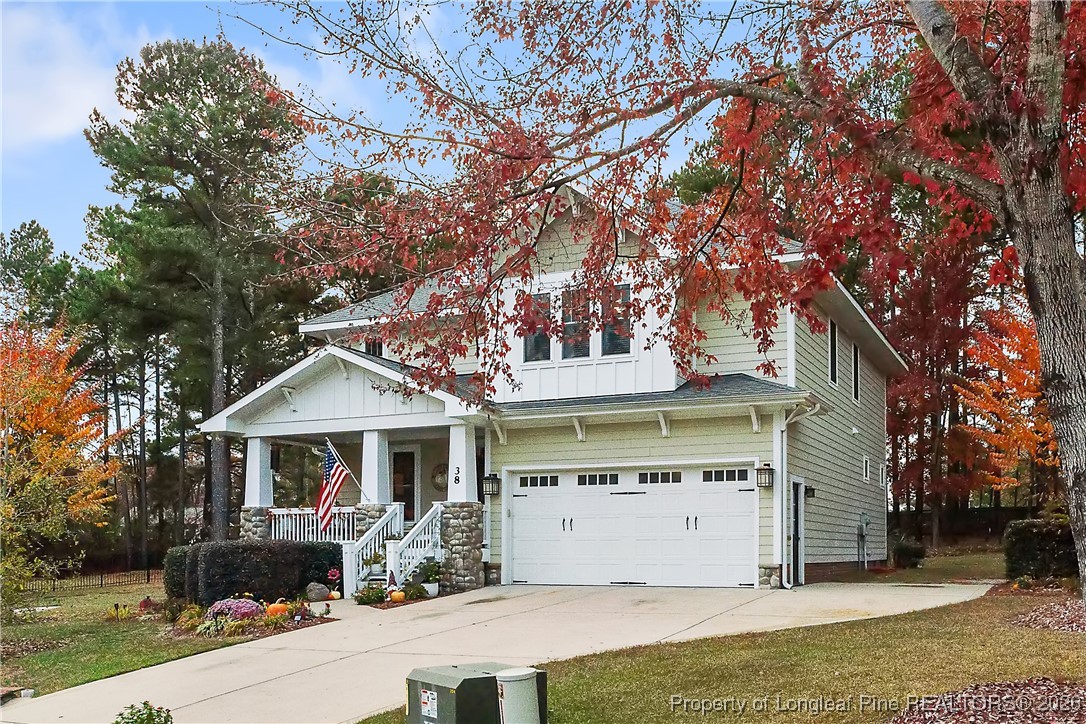 38 Overview Court Spring Lake, NC 28390 - Photo 2 of 50 a front view of a house with garden