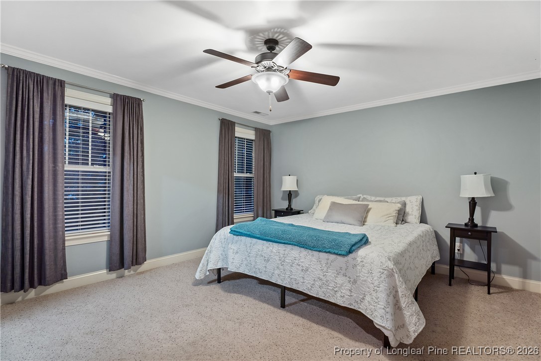 38 Overview Court Spring Lake, NC 28390 - Photo 33 of 50 a bedroom with a bed and window