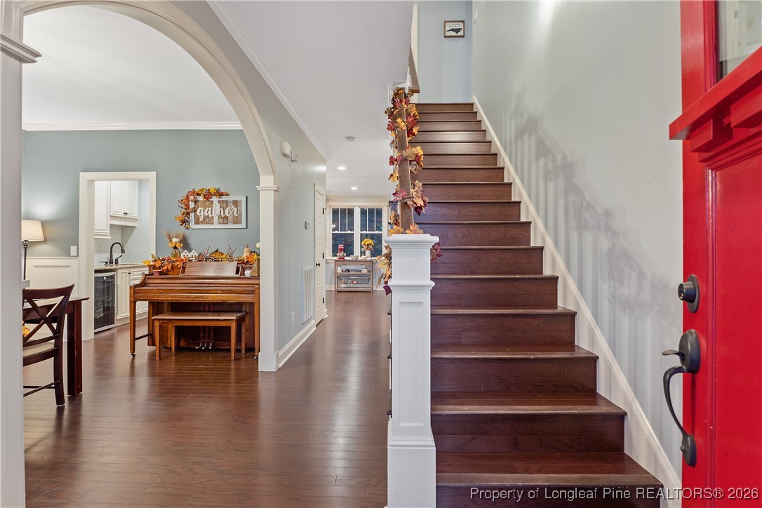 38 Overview Court Spring Lake, NC 28390 - Photo 4 of 50 a view of entryway and hall with wooden floor