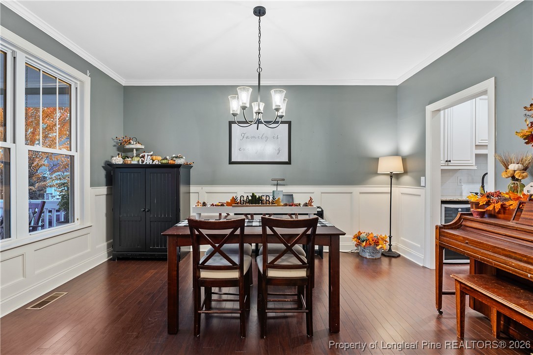 38 Overview Court Spring Lake, NC 28390 - Photo 5 of 50 a view of a dining room with furniture window and wooden floor