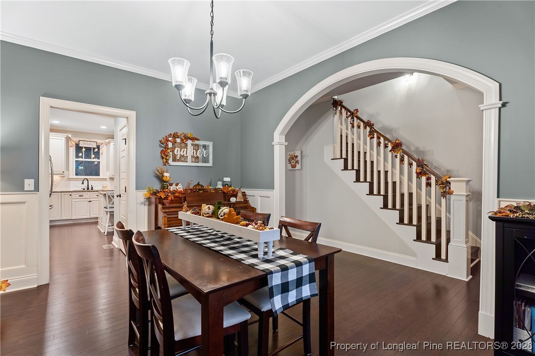 38 Overview Court Spring Lake, NC 28390 - Photo 6 of 50 a view of a dining room with furniture and wooden floor