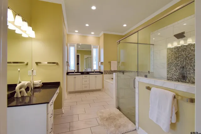 a bathroom with a bathtub and a sink