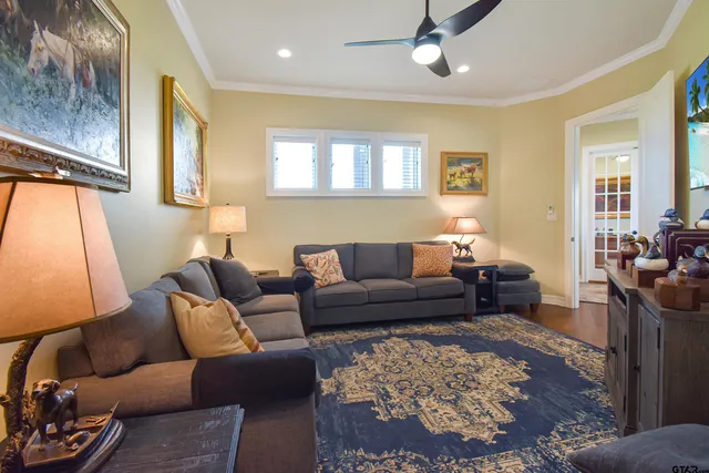 a bathroom with a sink a toilet and vanity