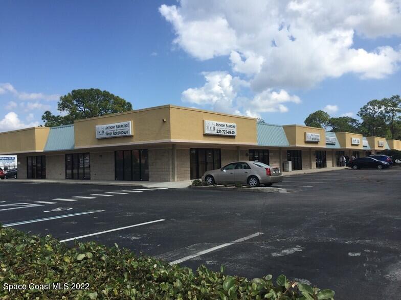 575 South Wickham Road, Unit F Melbourne, FL 32904 - Photo 1 of 14 4