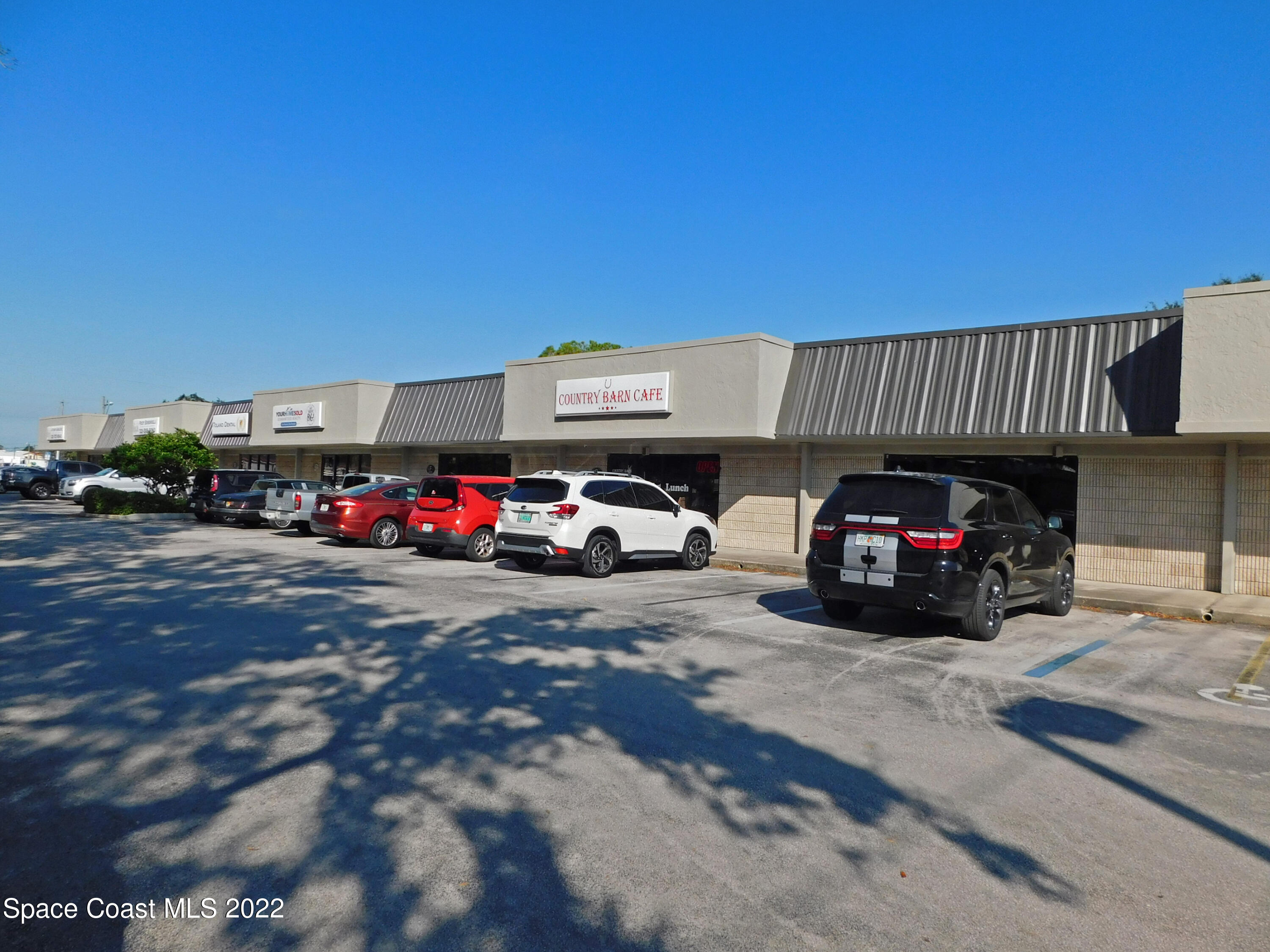 575 South Wickham Road, Unit F Melbourne, FL 32904 - Photo 2 of 14 1 - 575 S Wickham