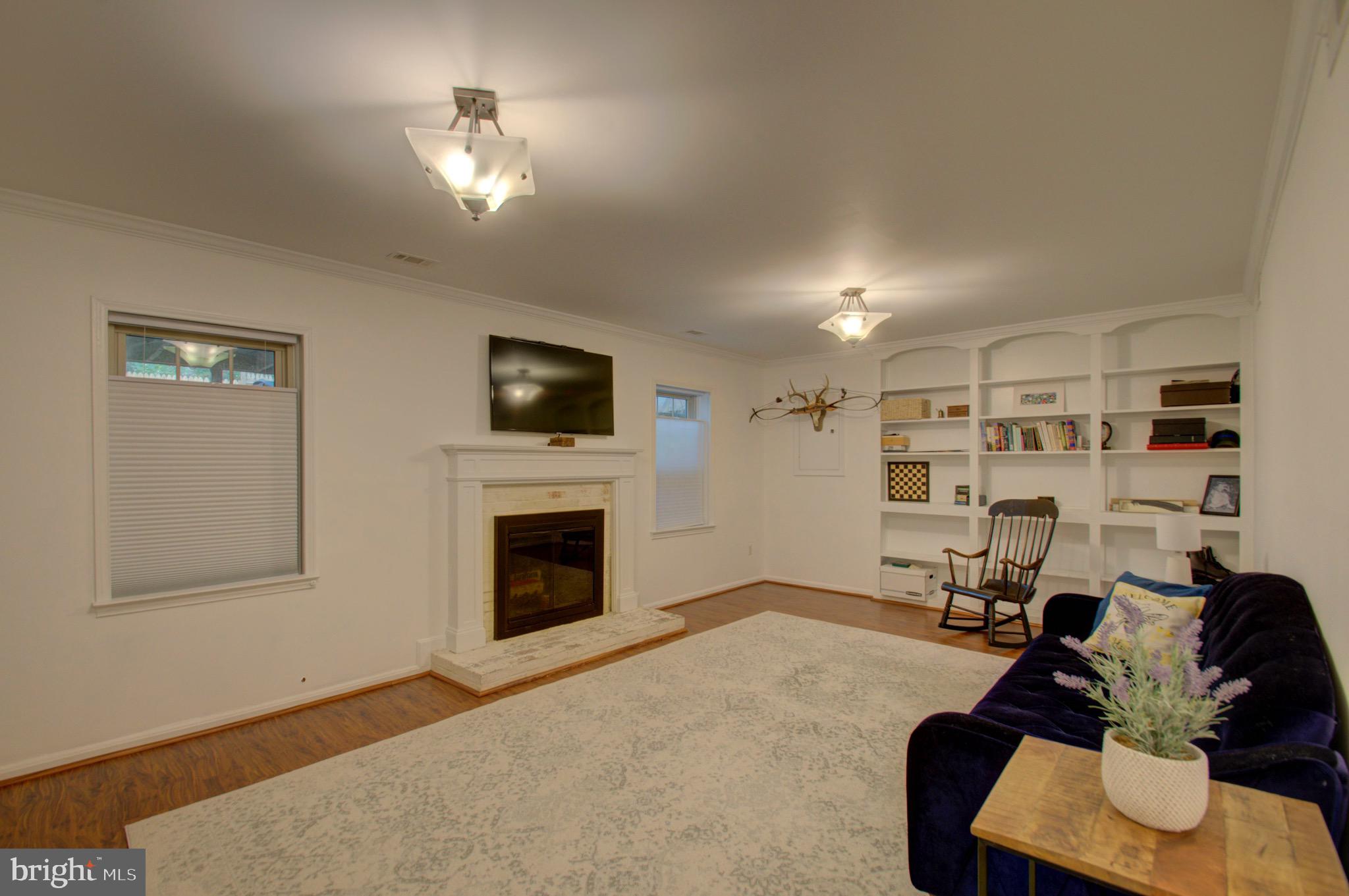 6412 Wainfleet Court Springfield, VA 22152 - Photo 34 of 43 Family room with wood burning fireplace..