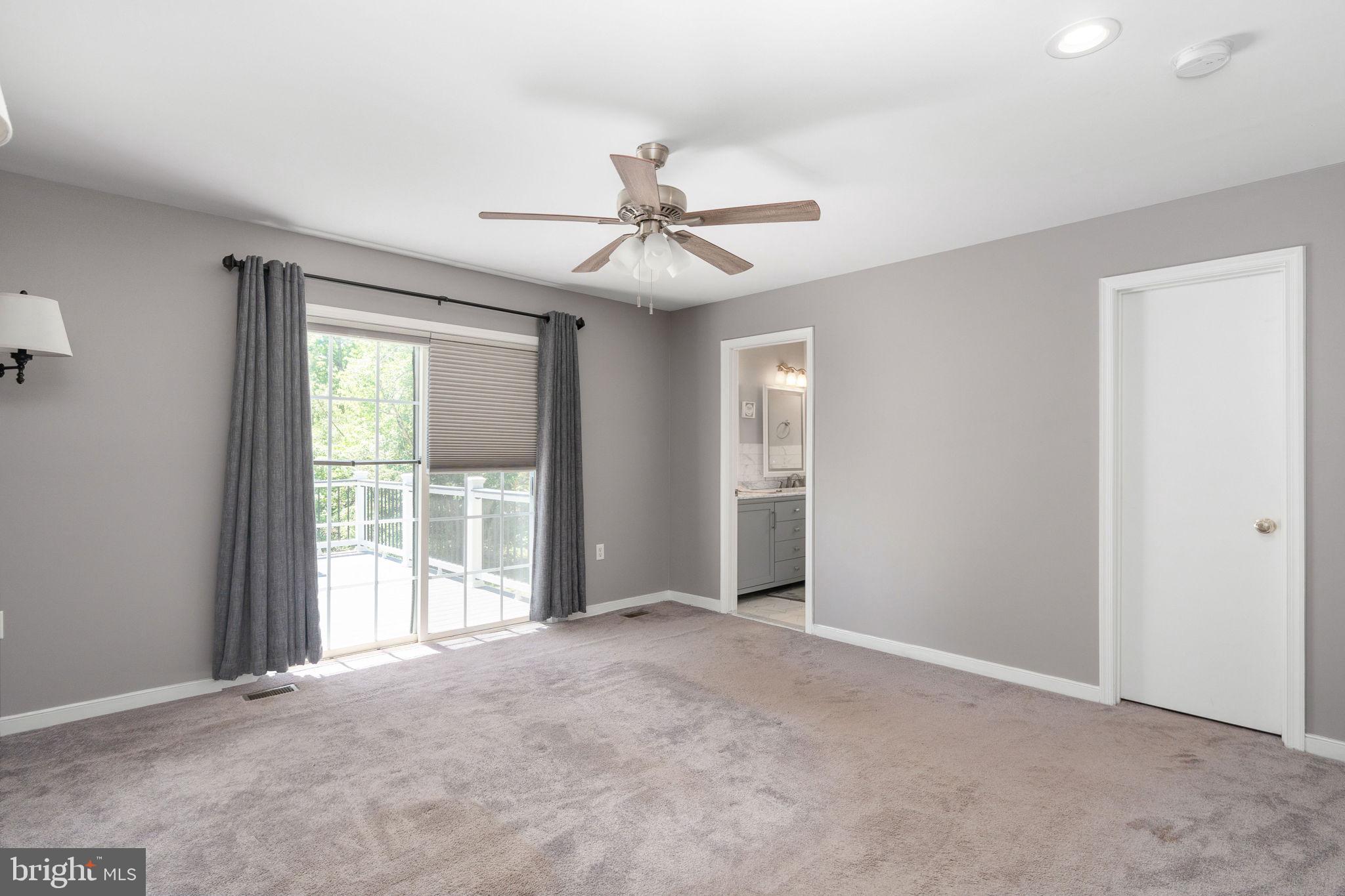 8009 Burrell Road Fredericksburg, VA 22407 - Photo 30 of 66 Spacious living area with natural light.
